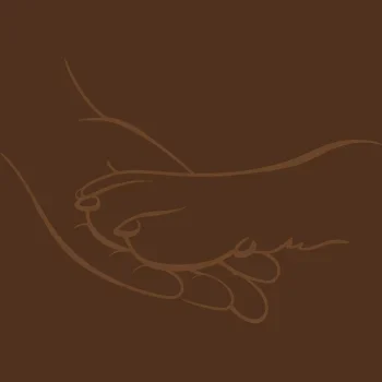 Eine Hand und eine Hundepfote, die sich sanft berühren.